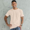A male model wearing a pale pink LOFT Mens Premium Cotton Tshirt with a longer body, a mid-weight, regular fit, and a crew neck.