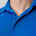 Royal blue short sleeve polo with textured stripe pattern and matching button placket