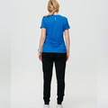 Black French terry joggers with elasticated cuffs and royal blue tee shown from back