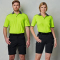 Black ripstop cargo shorts with multiple pockets and hi-vis lime polo shirts featuring charcoal contrast collar