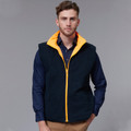 Navy polar fleece safety vest with bright yellow high-visibility reverse side and contrasting yellow zipper and collar