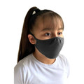 Charcoal grey reusable face mask on child with white tee, showing contoured fit and ear loops