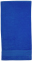 Royal blue cotton velour beach towel with contrasting navy horizontal stripe at base