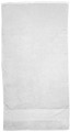 White cotton velour beach towel with decorative horizontal stripe panel near hem