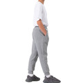 Grey marle cotton track pants with elasticated cuffs and side pockets shown in profile view