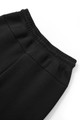 Black kids trackpants with elasticated waistband showing three-layer cotton construction detail