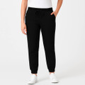 Black track pants with elasticated cuffs and drawstring waist on model with hands in pockets