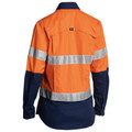Back view of women's orange and navy hi vis ripstop shirt with perforated reflective tape across back and sleeves