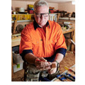 Orange hi vis work shirt with navy contrast collar and cuffs featuring dual chest pockets with button flaps
