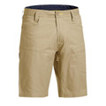 Khaki ripstop work shorts with navy contrast waistband lining and multiple utility pockets
