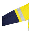 Close-up of hi vis shirt sleeve in yellow and navy with silver reflective tape and side venting detail