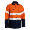 Orange and navy fire resistant work shirt with white reflective tape and navy collar