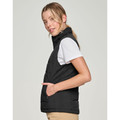 Woman wearing black quilted puffer vest with mock neck, zip front, and side zip pockets