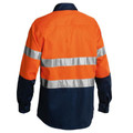 High visibility work shirt in fluorescent orange and navy with silver reflective tape across back and sleeves