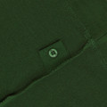 Close-up of bottle green kids polo shirt showing tonal button and pique fabric placket detail