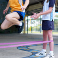 Navy athletic skort with white contrast piping worn during outdoor activity