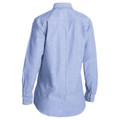 Back view of a women's long sleeve chambray shirt in pale blue with gold buttons and centre back pleat