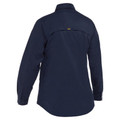 Navy long sleeve women's work shirt rear view showing vented back yoke and branded tab