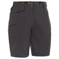 Charcoal grey women's cargo shorts with angled front pocket, button waistband and yellow branded waistband lining