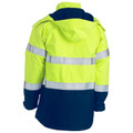 Rear view of ladies hi vis shell jacket in fluoro yellow and navy with reflective tape and attached hood