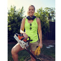 High-visibility neon yellow racer back singlet with contrast stitching worn outdoors