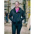Charcoal zip-front fleece hoodie with hood up, layered over hot pink polo in warehouse setting