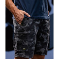 Charcoal grey camouflage cargo shorts with multi-pocket design and cargo pockets on thigh, paired with navy tee