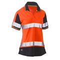 Women's hi vis polo in orange and navy with reflective tape bands, V-neck placket, and yellow-striped collar and cuffs