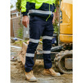Navy cargo pants with silver reflective tape on legs and cargo pockets with yellow zipper details