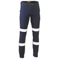 Navy work pants with white reflective tape bands at knees and lower legs, cargo pockets and elasticated cuffs