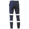 Navy cargo work pants with silver reflective tape at knees and calves, elasticated ankle cuffs, rear view showing cargo pockets
