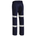 Navy work pants with twin silver reflective tape strips on each leg, rear view showing taped detail