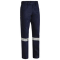 Navy work pants with silver reflective tape positioned around lower legs and cargo pocket on side