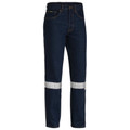 Dark navy denim work jeans with silver reflective tape around legs and classic five-pocket styling
