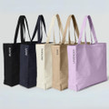 Five canvas tote bags with matching handles in black, navy, natural, oak, and lavender with printed colour labels