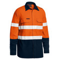 Orange and navy two-tone long sleeve FR work shirt with white reflective tape and chest pockets