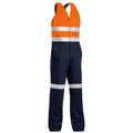 Hi-vis action back overalls in fluorescent orange and navy with silver reflective tape on shoulders and legs