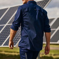 Navy work shirt with roll-up sleeves and back shoulder vents, rear view