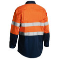 High visibility work shirt in orange and navy with silver reflective tape across back and sleeves
