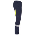 Navy stretch cargo pant with hi-vis yellow side vents, cargo pockets, and reflective ankle tape — side view packshot