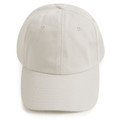 Natural cotton twill unstructured cap with curved brim and six-panel construction with eyelets