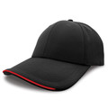 Black baseball cap with red contrast piping along curved peak and six-panel construction