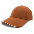 Rust orange baseball cap with white contrast piping on curved peak and six-panel structured crown