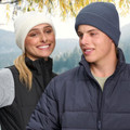 Roll Up Cable Knit Snug Beanie, a comfortable, warm winter hat with a thick cable knit texture and roll-up cuff.
