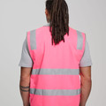 Back view of fluorescent pink hi-vis vest with silver reflective tape and grey contrast sleeves
