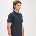Charcoal grey cotton pique polo shirt with classic collar and short sleeves on male model