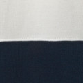 Close-up of light grey and navy ribbed knit fabric panels with contrasting horizontal stripe detail