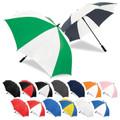 Large golf umbrellas in alternating two-tone panels shown open, featuring Kelly green-white and navy-white colourways with full colour range grid below