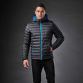 Man wearing charcoal quilted hooded insulated jacket with royal blue zip and pocket contrast trim