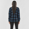 Back view of women's teal and black plaid long sleeve flannel shirt with curved hem